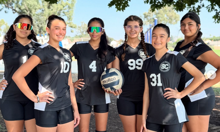 Sonrise Christian High School girls’ volleyball team smiling and posing after their first-ever game, celebrating a historic milestone for SCHS athletics.